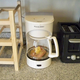 Illustration for article titled MacGyver Chef: Poached Chicken and Couscous in a Coffee Maker
